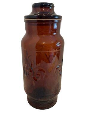 Vintage Amber Glass Apothecary Jar With Lid Embossed Swirl Design 8" Tall